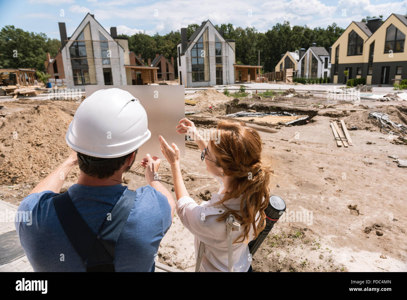 Intelligent professional architects sharing their ideas Stock Photo