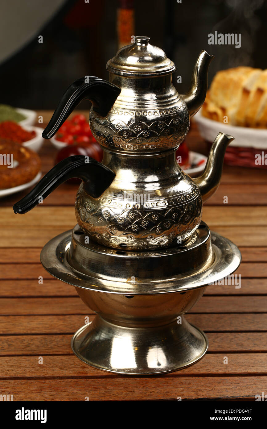 https://c8.alamy.com/comp/PDC4YF/turkish-tea-pot-with-glass-of-tea-PDC4YF.jpg