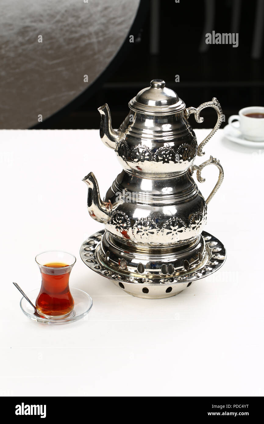 Turkish tea pot with glass of tea Stock Photo
