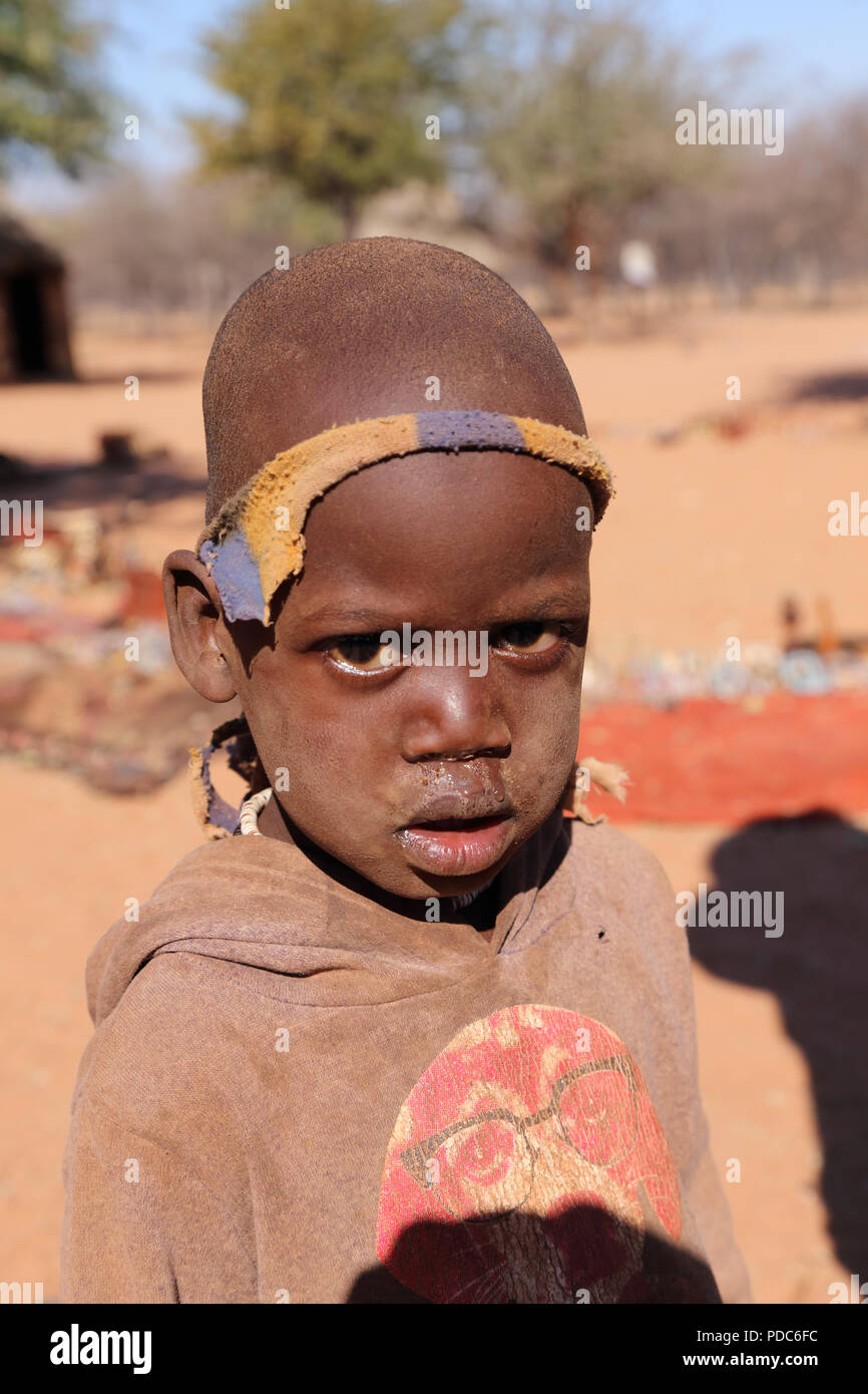Himba child, Otjikandero village, northern Namibia Stock Photo