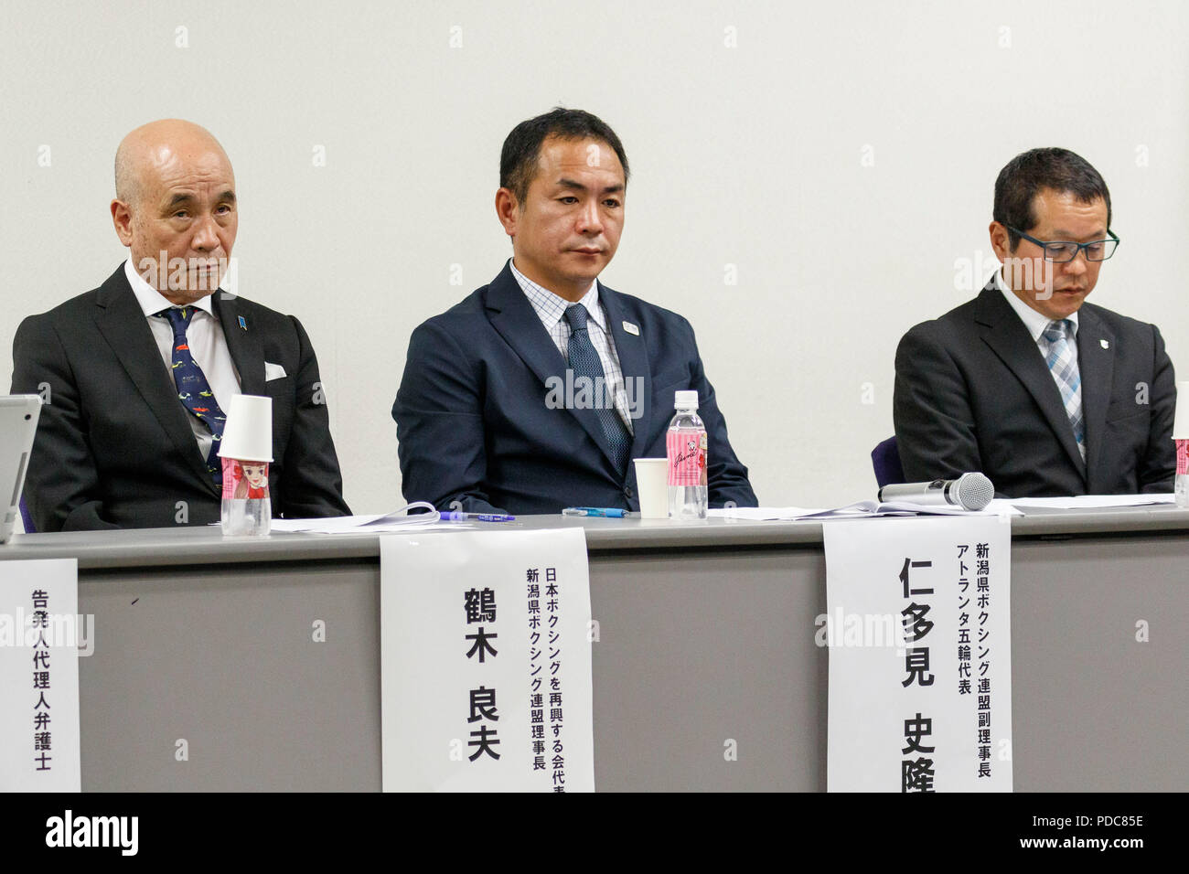 (L to R) Former Japan Amateur Boxing Federation (JABF) board member Yoshio Tsuruki, retired boxer Fumitaka Nitami, and Hiroyoshi Kikuchi, vice president of Miyazaki Prefecture Boxing Federation, speak during a news conference on August 8, 2018, Tokyo, Japan. Tsuruki, Nitami, and Kikuchi attended a news conference after the JABF president Akira Yamane announced his resignation in spite of denying allegations of misconduct, including match fixing and the misuse of grant money. Credit: Rodrigo Reyes Marin/AFLO/Alamy Live News Stock Photo