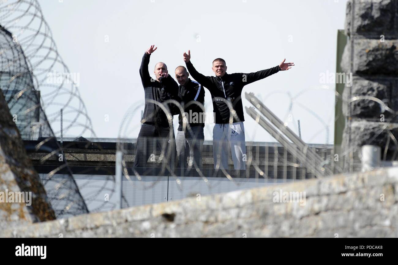 Prison protest, Three prisoners protest on the rooftop of HM Prison Portland, Young Offenders Institution, Portland, Dorset, UK Credit: Finnbarr Webster/Alamy Live News Stock Photo