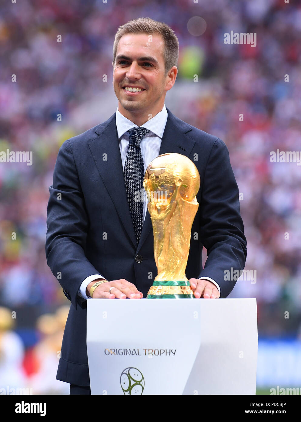 Luzhniki Stadium, Moscow, Russia. 15th July, 2018. FIFA World Cup Football  Final, France versus Croatia; Philipp Lahm (World Champion 2014 Germany)  presents the World Cup trophy Credit: Action Plus Sports/Alamy Live News