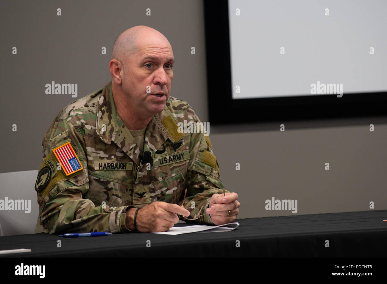Army Col. Cary Harbaugh, U.S. Special Operations Command Warrior Games 2019 director, briefs local media on the 2019 DoD Warrior Games in Tampa, Fla., Aug. 6, 2018. The games, scheduled from June 21-30, introduce wounded, ill and injured service members and veterans to paralympic-style sports. More than 300 athletes will compete in 14 events located in downtown Tampa and surrounding areas. (Photo by U.S. Air Force Master Sgt. Barry Loo) Stock Photo