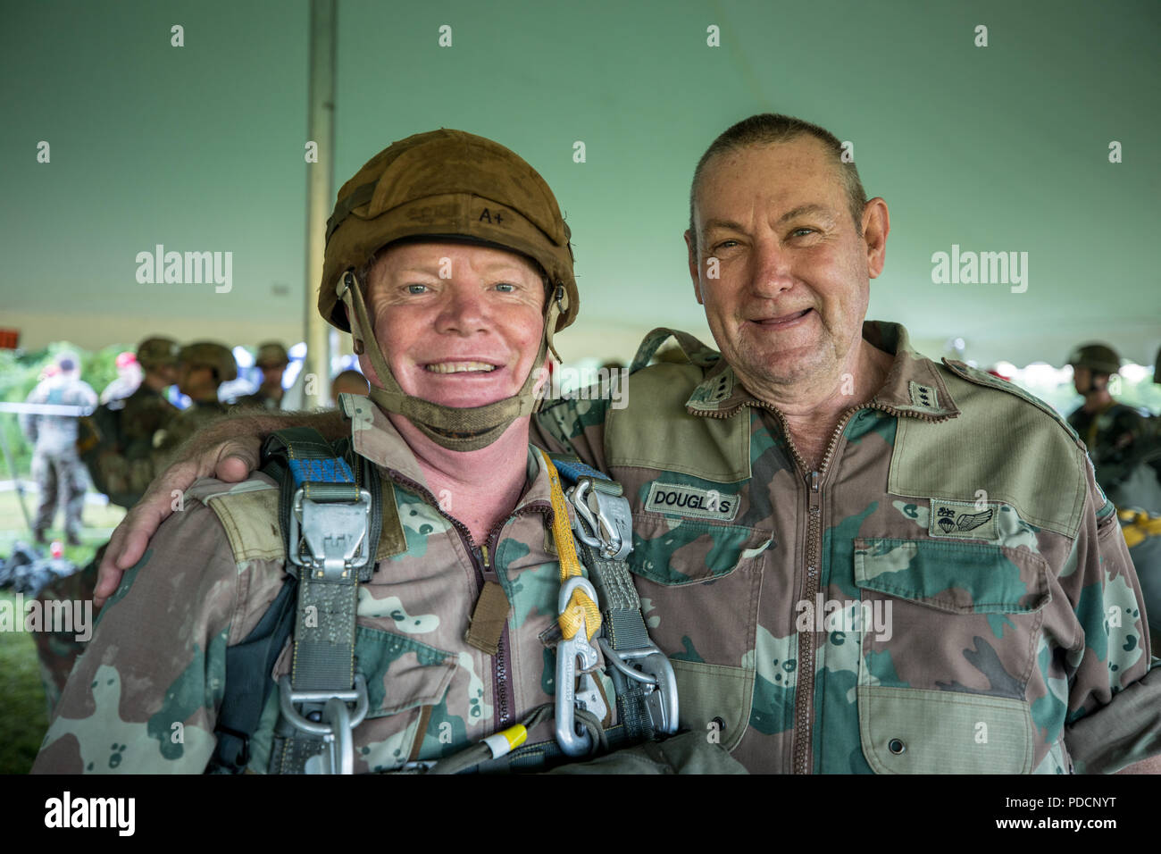 South African paratroopers pose for a photo before a jump during