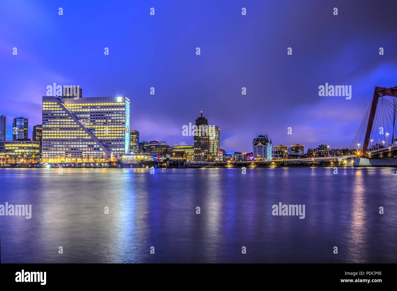 Rotterdam, The Netherlands, January 13, 2016: the downtown waterfront between Willemswerf and Willems bridge during the blue hour before sunrise Stock Photo
