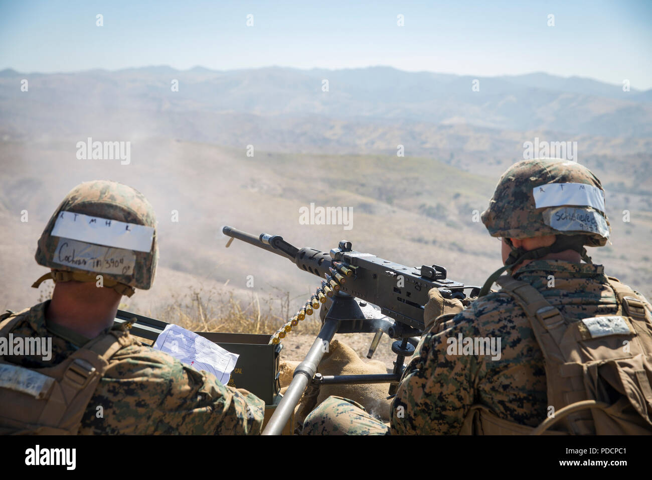 U.S. Marine Corps Lance Cpl. Tyler Cochran (left) and Pfc. Spencer