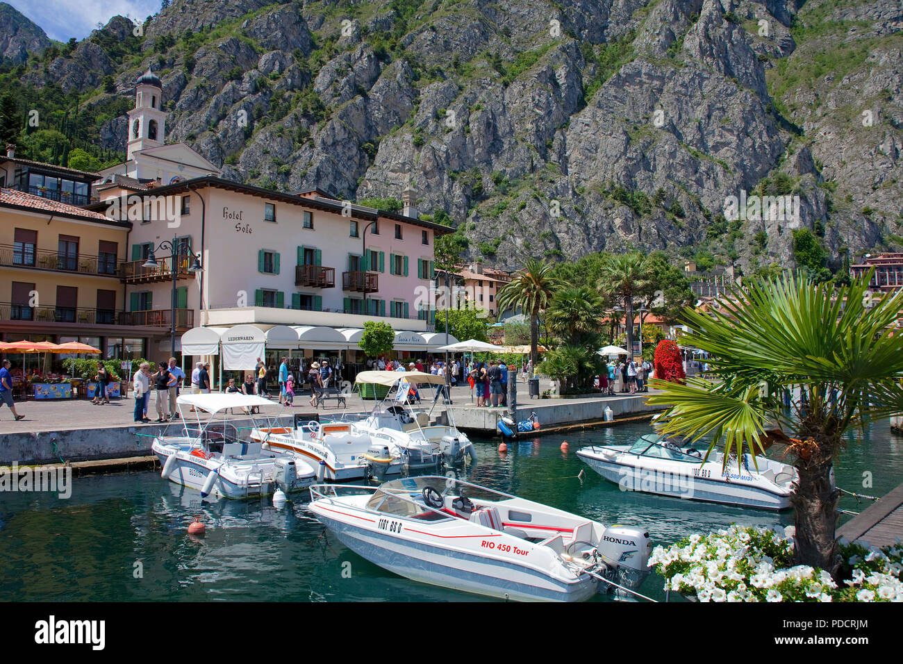 Motor boats at harbour of Limone, Limone sul Garda, Lake Garda, Lombardy, Italy Stock Photo