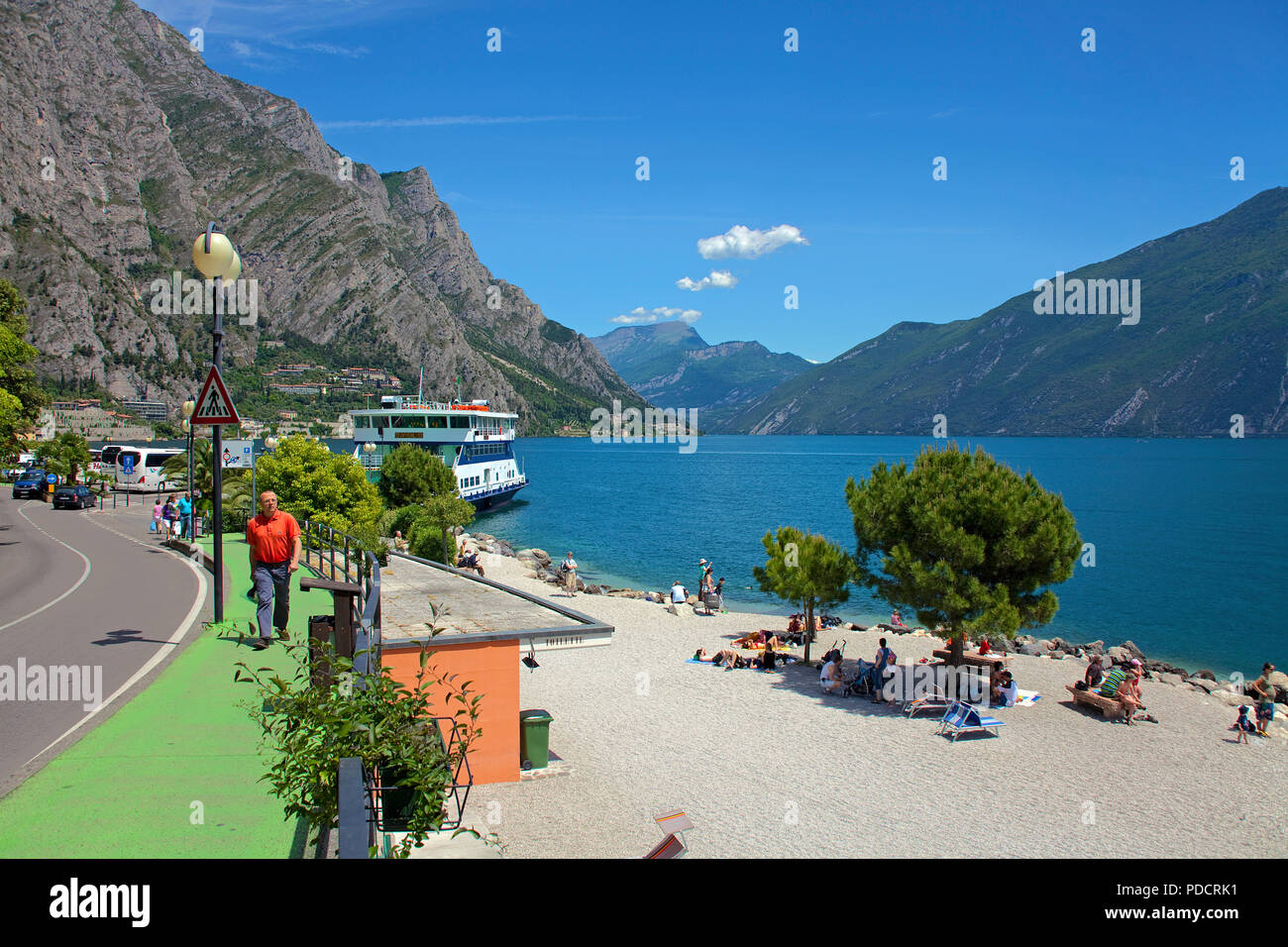 People at the beach of Limone, Limone sul Garda, Garda lake, Lombardy, Italy Stock Photo
