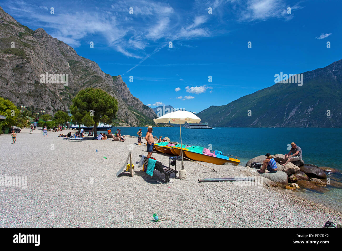 People at the beach of Limone, Limone sul Garda, Garda lake, Lombardy, Italy Stock Photo
