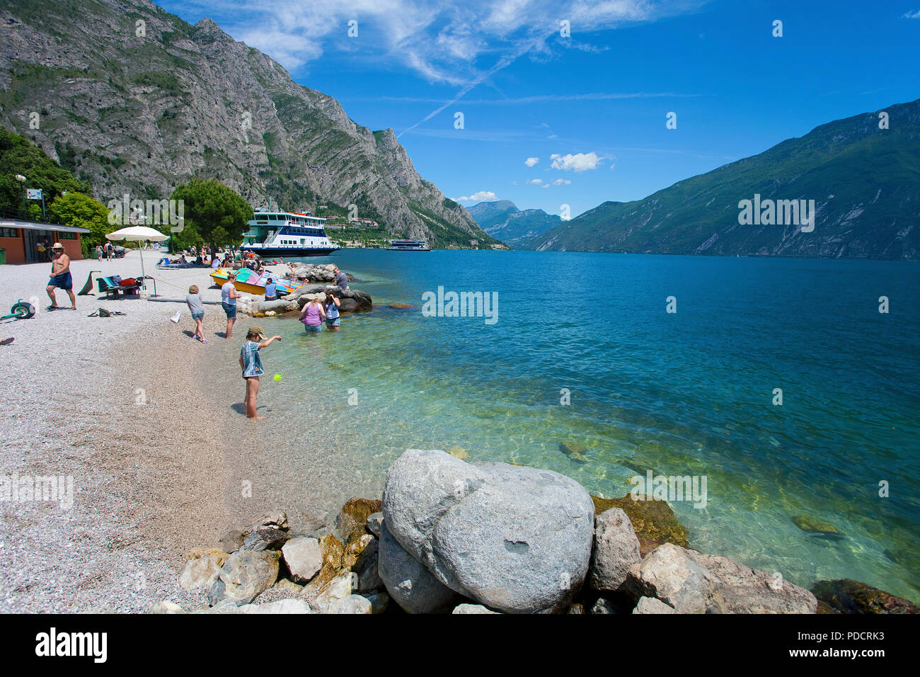 People at the beach of Limone, Limone sul Garda, Garda lake, Lombardy, Italy Stock Photo