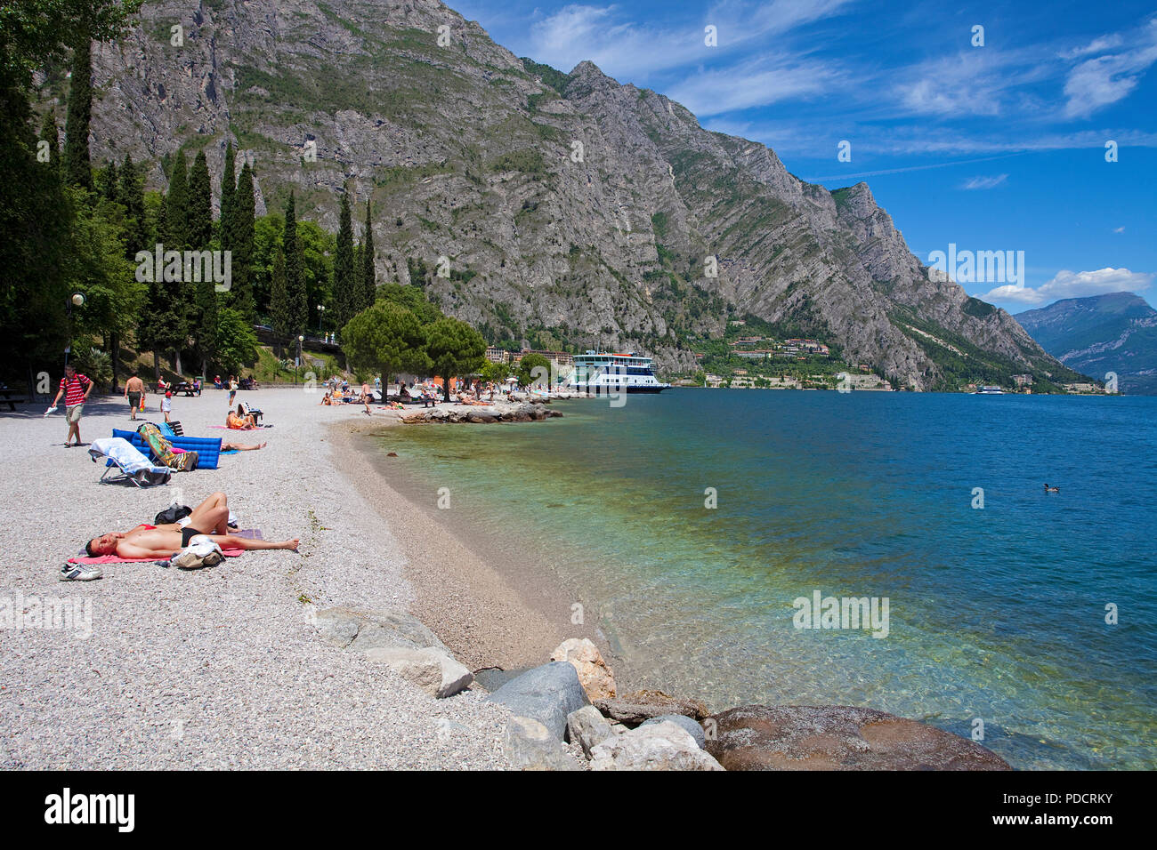 People at the beach of Limone, Limone sul Garda, Garda lake, Lombardy, Italy Stock Photo