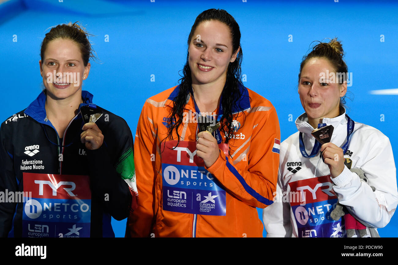 Italy's Noemie Batki (bronze) Netherlands' Celina Maria Van Duijn (gold) and Germany's Maria Kurjo (silver) on the podium for the Women's 10m Platform Final during day seven of the 2018 European Championships at Scotstoun Sports Campus, Glasgow. Stock Photo
