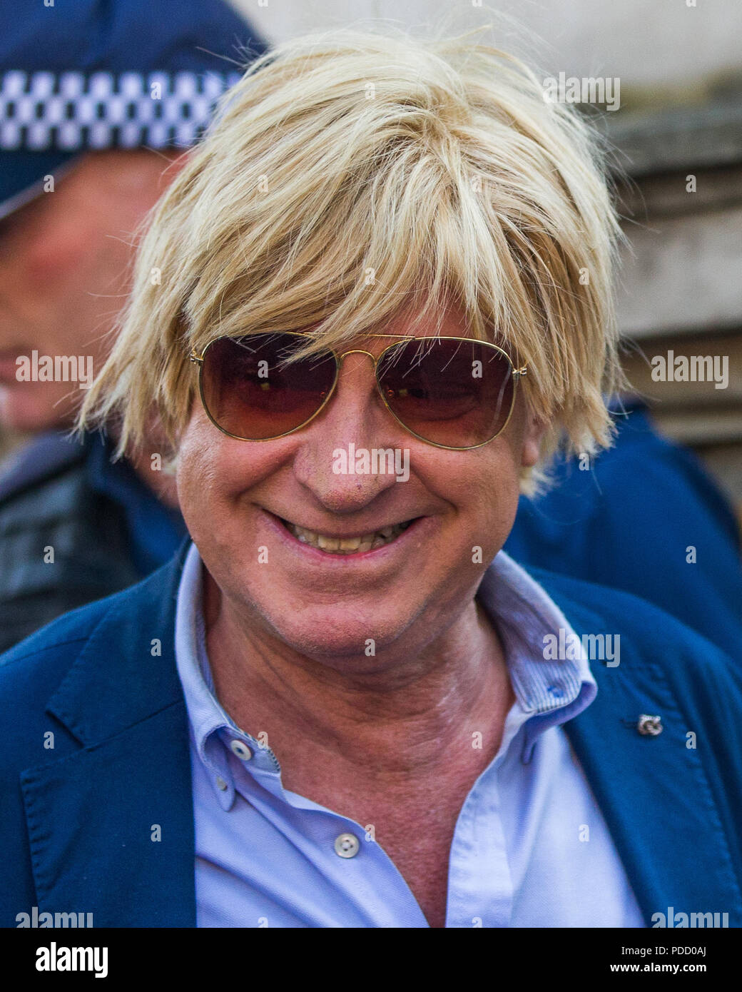 Conservative MP Michael Fabricant, seen here entering Downing Street, tweets challenge to US Embassy to use a US Marine to shoot down the Trump baby blimp due to fly during Trumps UK visit.    'I challenge @USAinUK to put a top US Marine marksman on the roof of the #fab new embassy to shoot down the stupid blimp of baby #Trump authorised by Sadiq Khan London Mayor.  1 shot’ll be enough! POW! @USAmbUK'  Featuring: Michael Fabricant MP Conservative Lichfield Where: London, England, United Kingdom When: 08 Jul 2018 Credit: Wheatley/WENN Stock Photo
