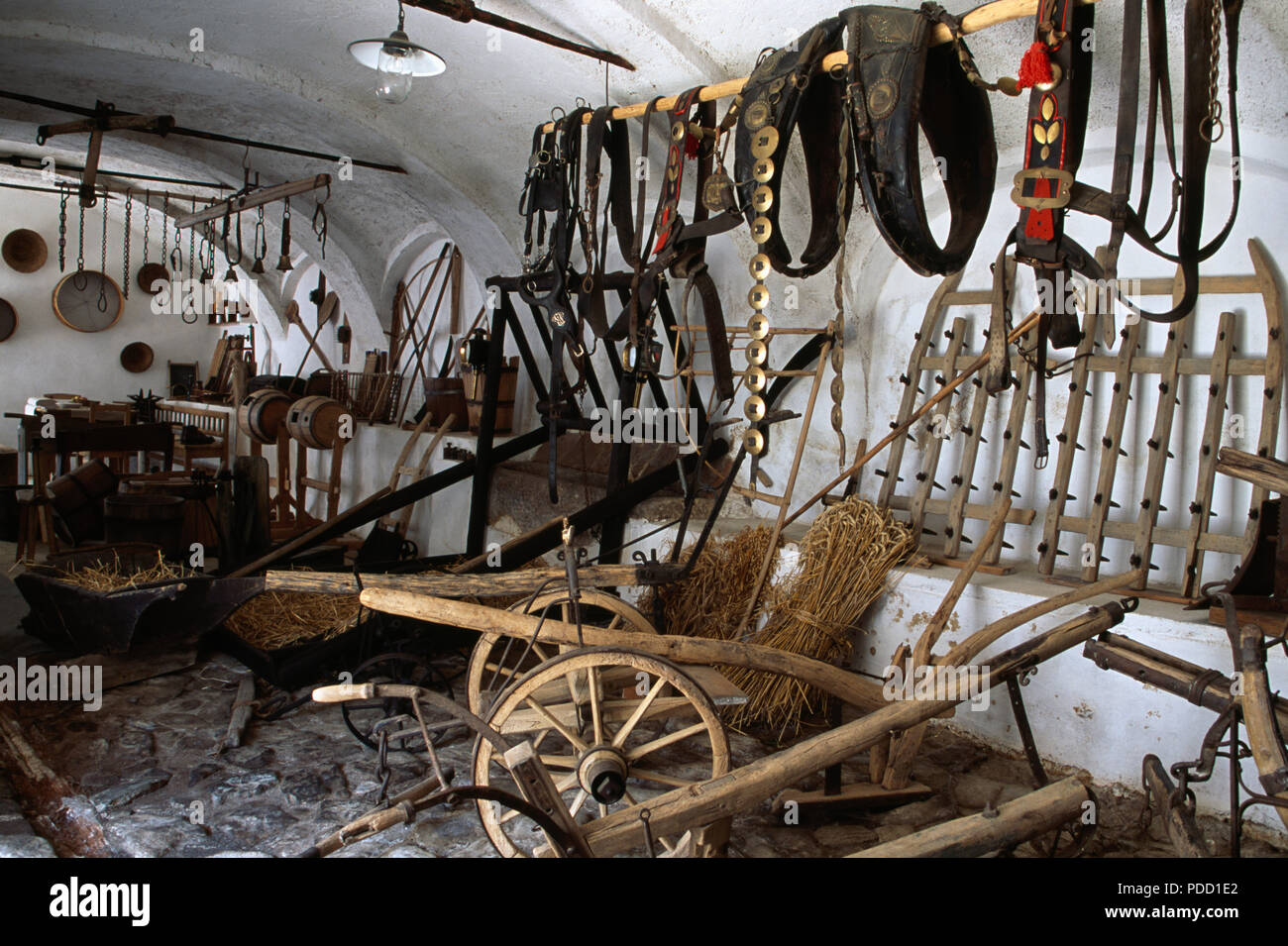 Old wooden carts and horse tack in museum in Holasovice historic