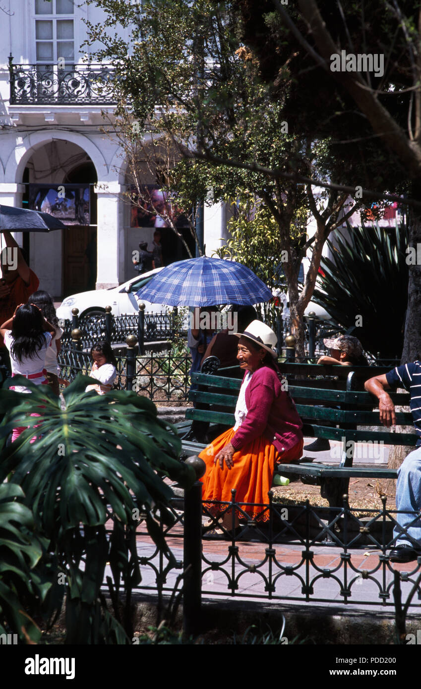 Traditional Dress At The Main Square In Cuenca Ecuador For