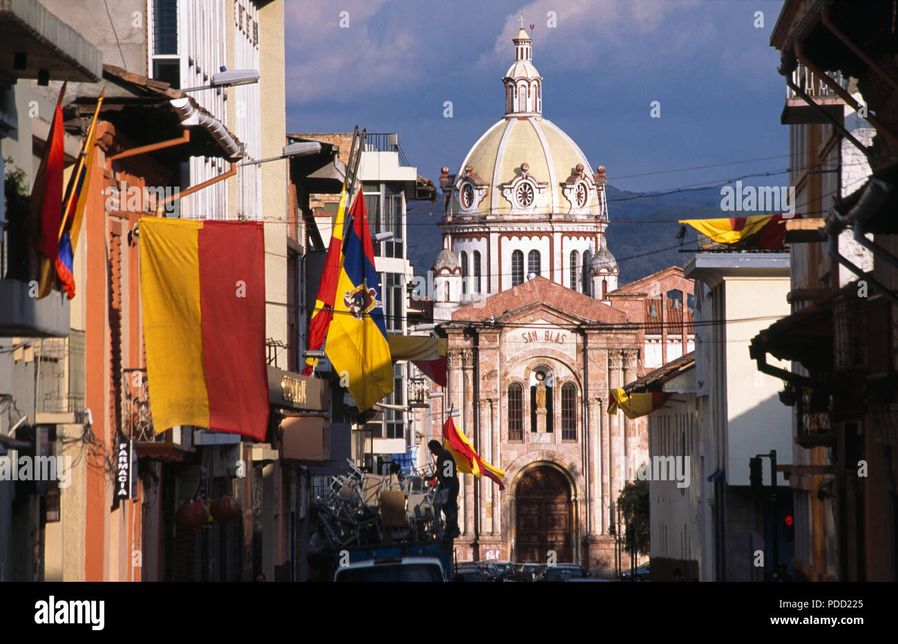 Church of San Blas among the flags of Cuenca in Cuenca, Ecuador Stock Photo