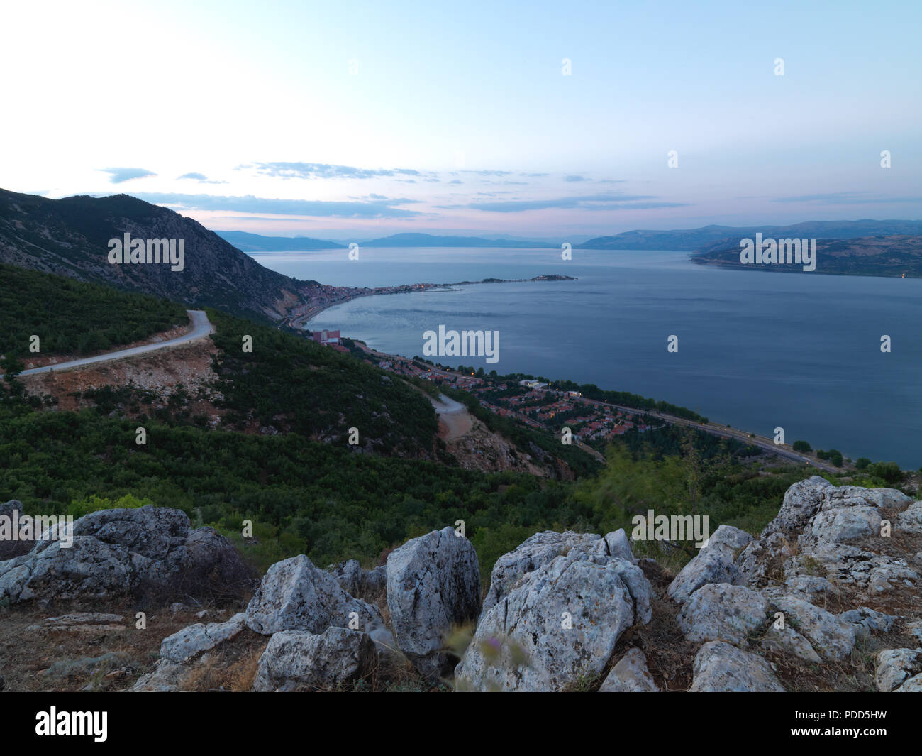 sunset on top of the sea with city view Stock Photo