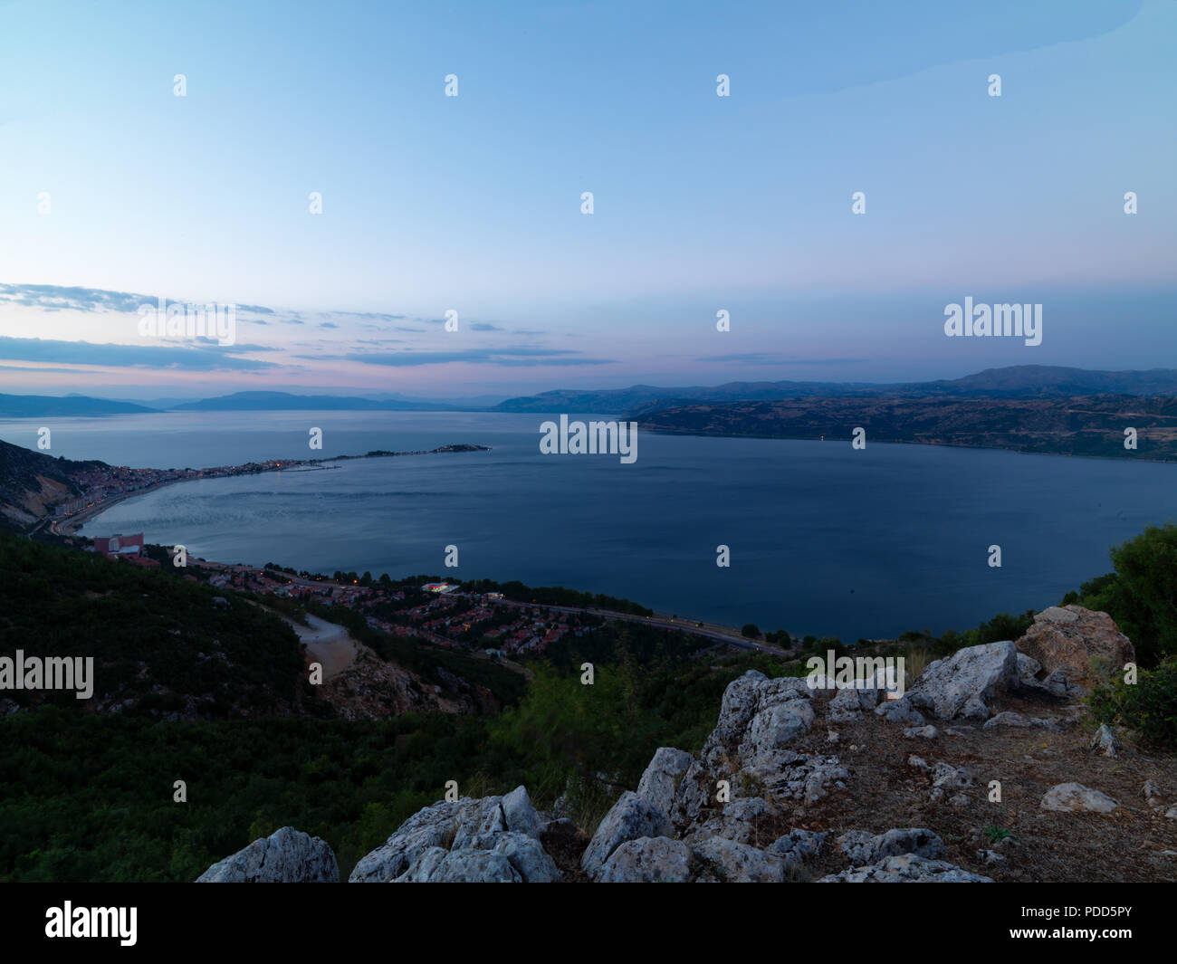 sunset on top of the sea with city view Stock Photo