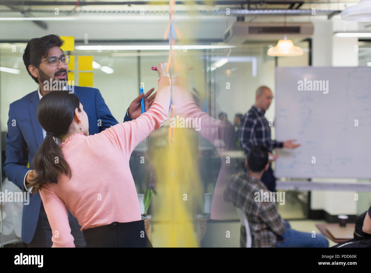 Creative business people brainstorming in office Stock Photo
