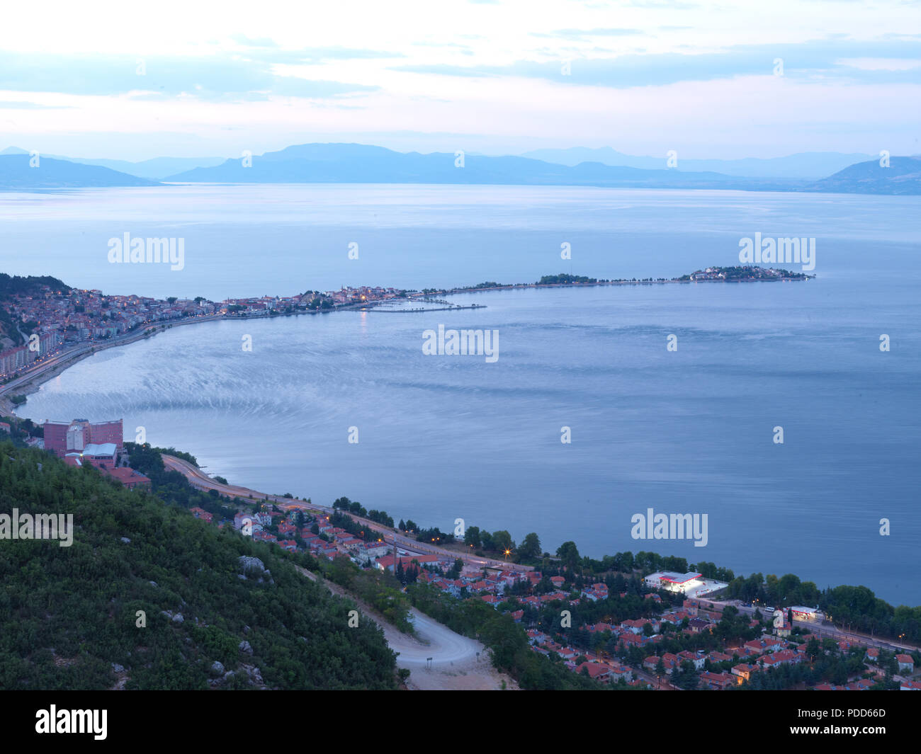 sunset on top of the sea with city view Stock Photo