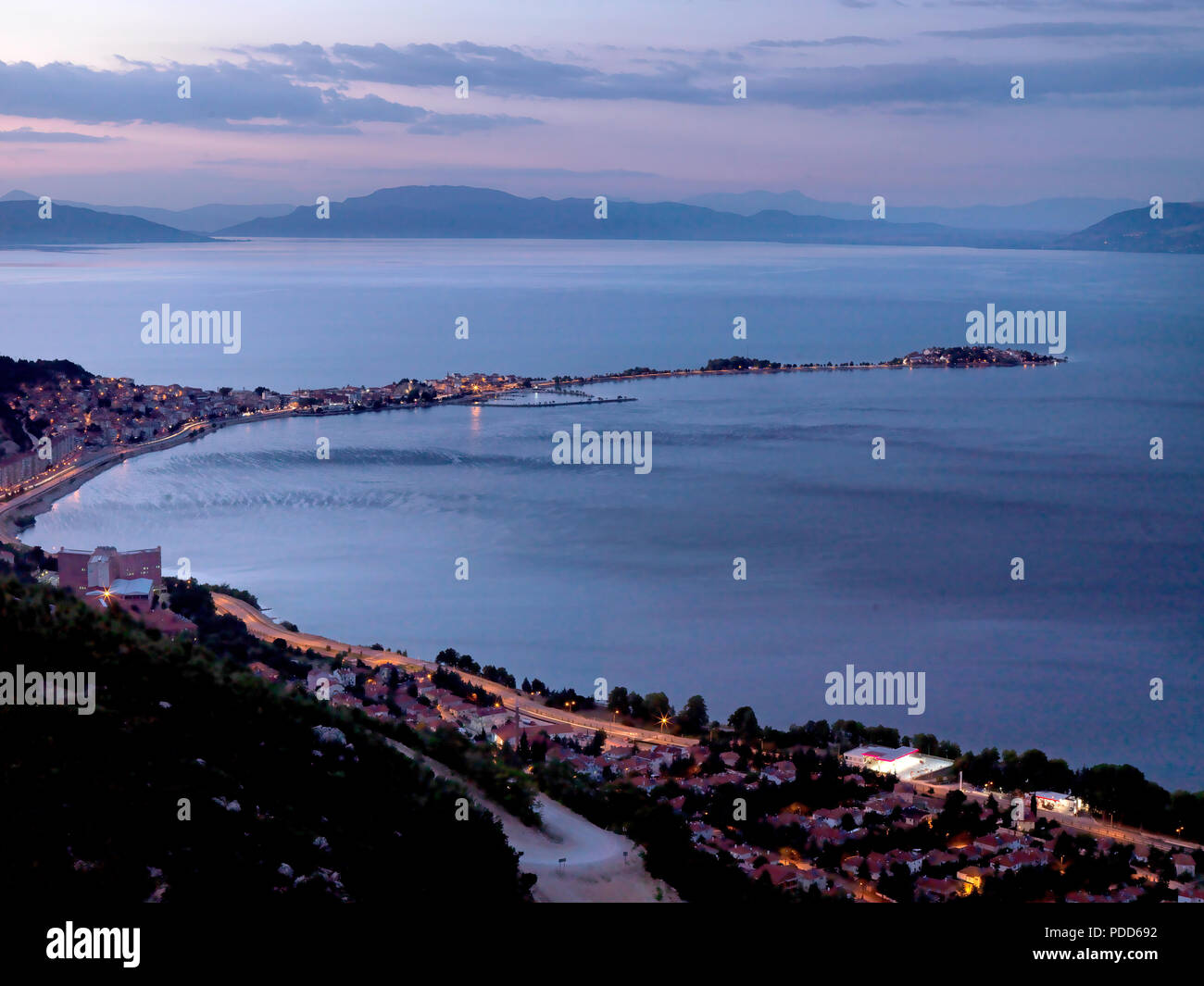 sunset on top of the sea with city view Stock Photo