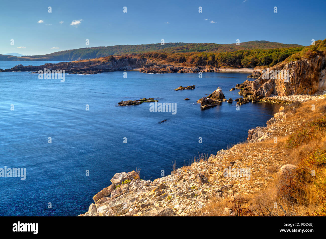 Beautiful landscape on rocky shore Stock Photo - Alamy