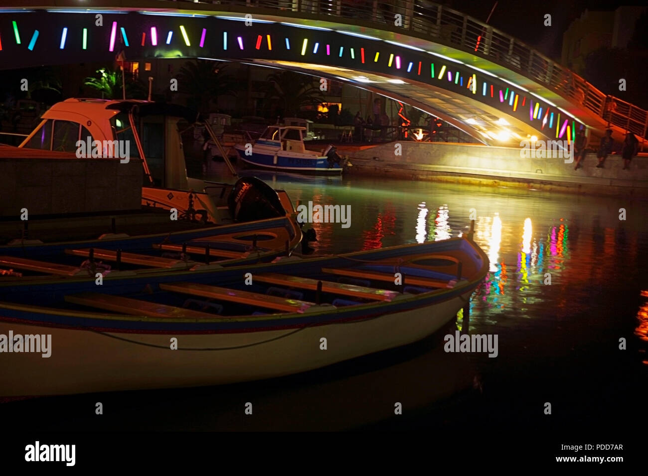 Illuminated footbridge over the harbour, Port de Plaisance, Gruissan