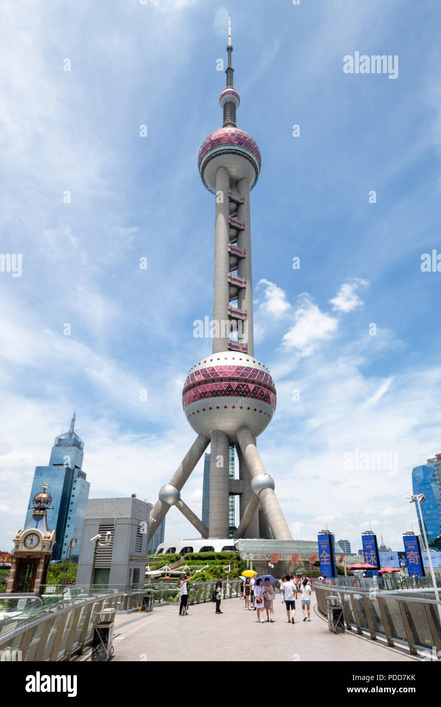 Oriental Pearl Television Tower in Shanghai, China on the banks of the Huangpu river.  Modern landmark building in Pudong district Stock Photo