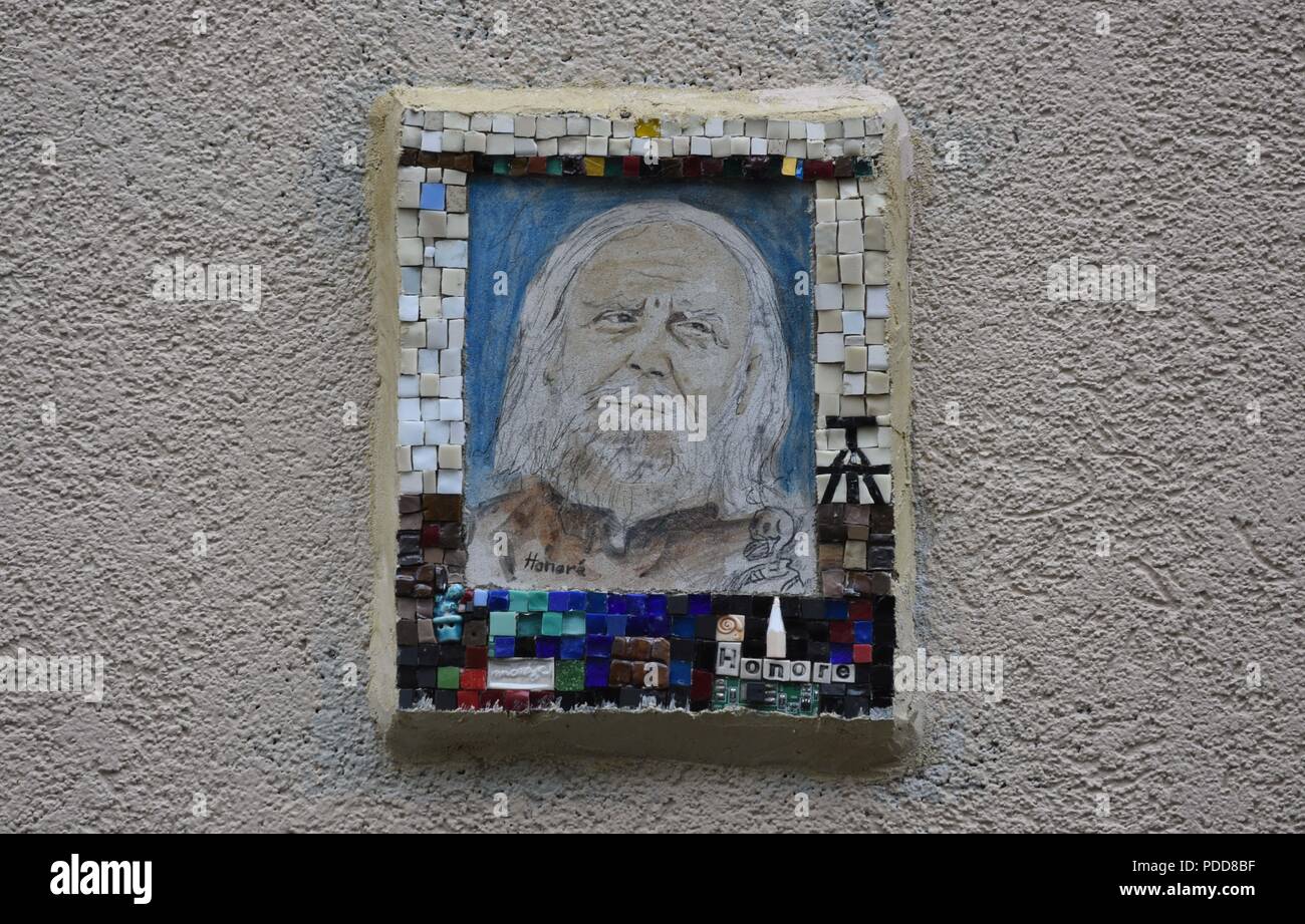 January 6, 2016 - Paris, France: Mural of HonorŽ, one of the Charlie Hebdo cartoonist killed on January 7, 2015. This art tribute is located near the former office of the French satirical magazine.  Commemoration de l'attentat contre Charlie Hebdo, un an apres l'attaque. *** FRANCE OUT / NO SALES TO FRENCH MEDIA *** Stock Photo