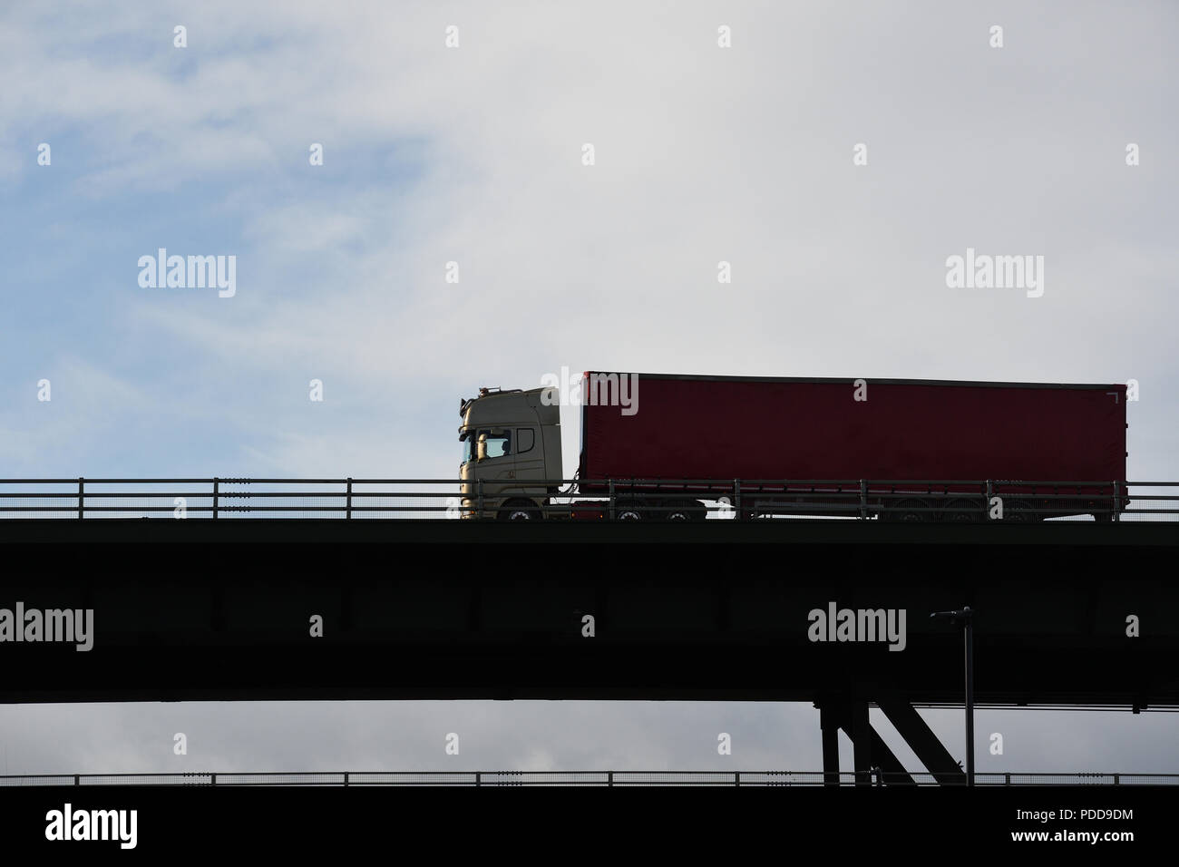 Scania truck pulling curtainsider trailer on Tinsley Viaduct, Sheffield Stock Photo