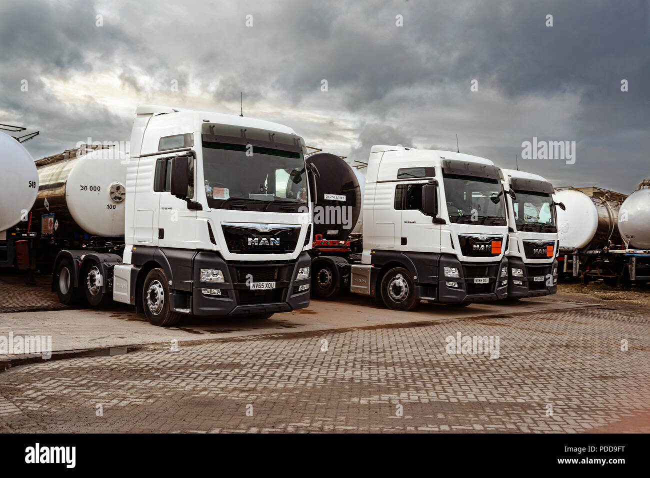 MAN trucks and tankers parked in South Yorkshire haulage yard Stock Photo