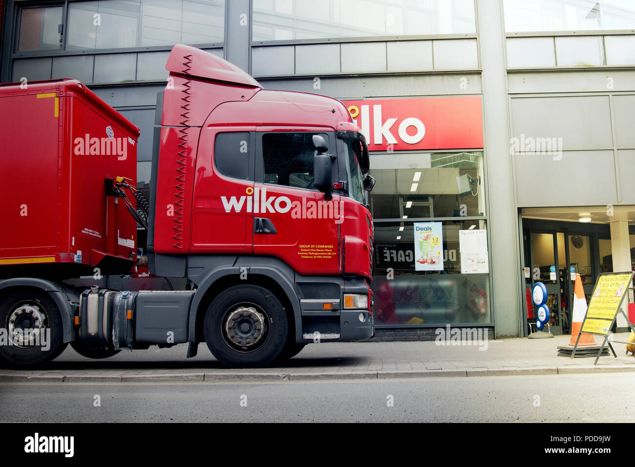 Scania container truck making final mile urban delivery Stock Photo