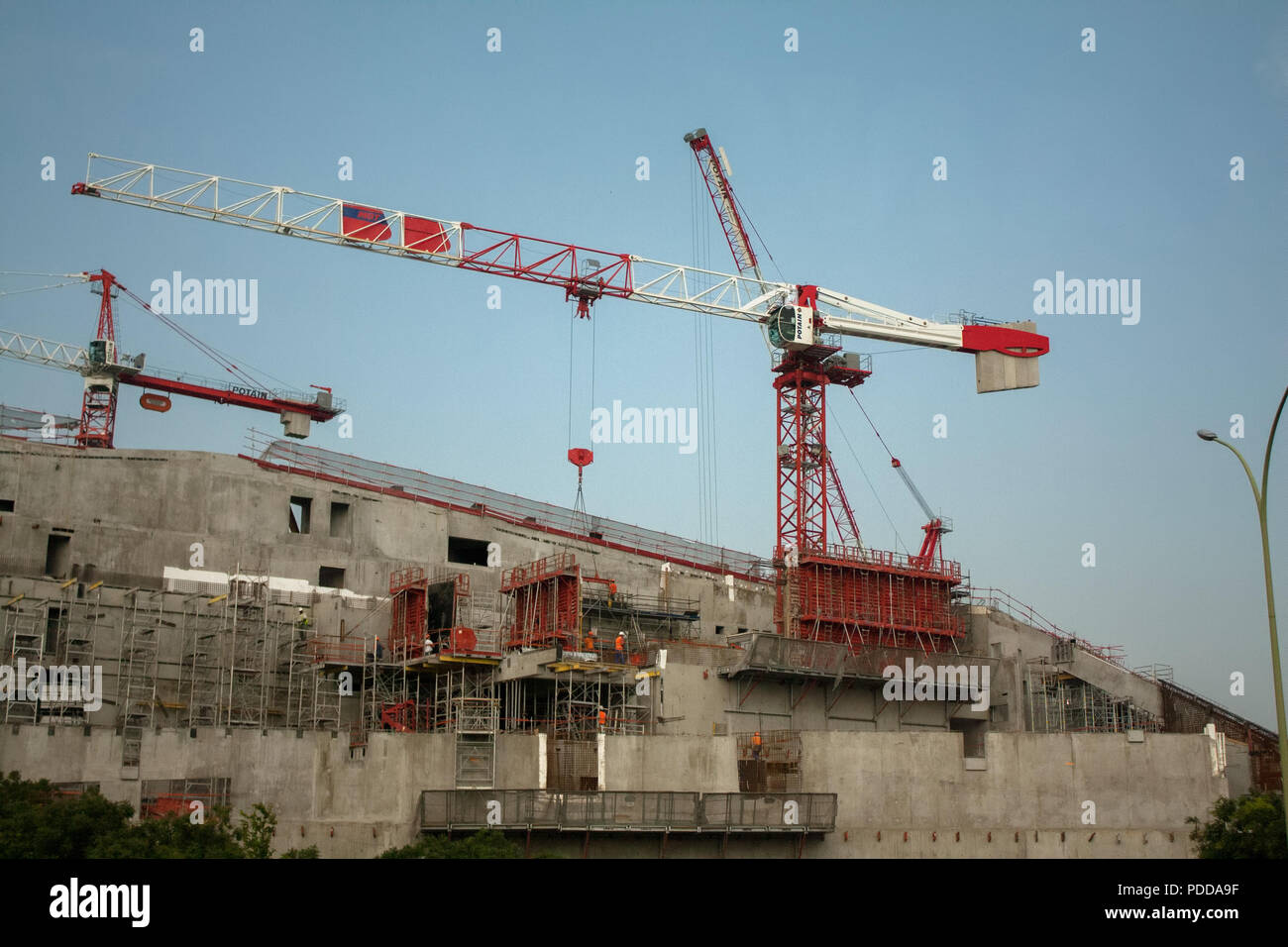 Big construction cranes building in Paris, summer Stock Photo