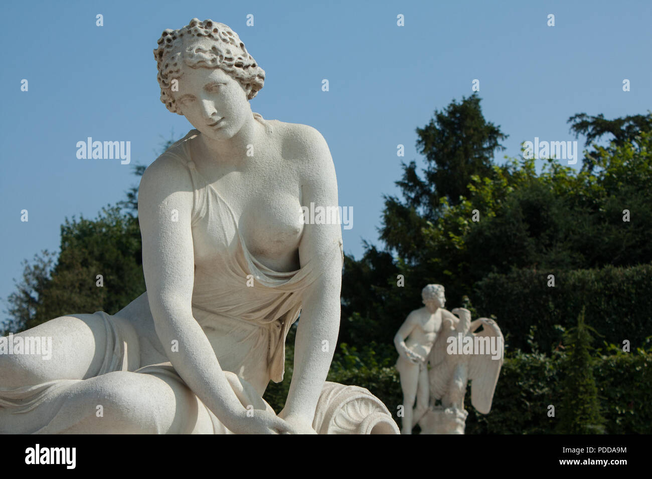 Statues from the labyrinth in Palace of Versailles garden, summer Stock