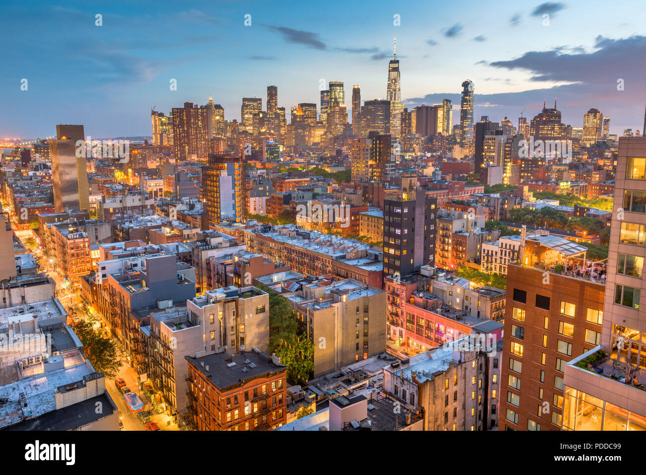 New York, New York, USA Financial district skyline from the Lower East Side at dusk. Stock Photo