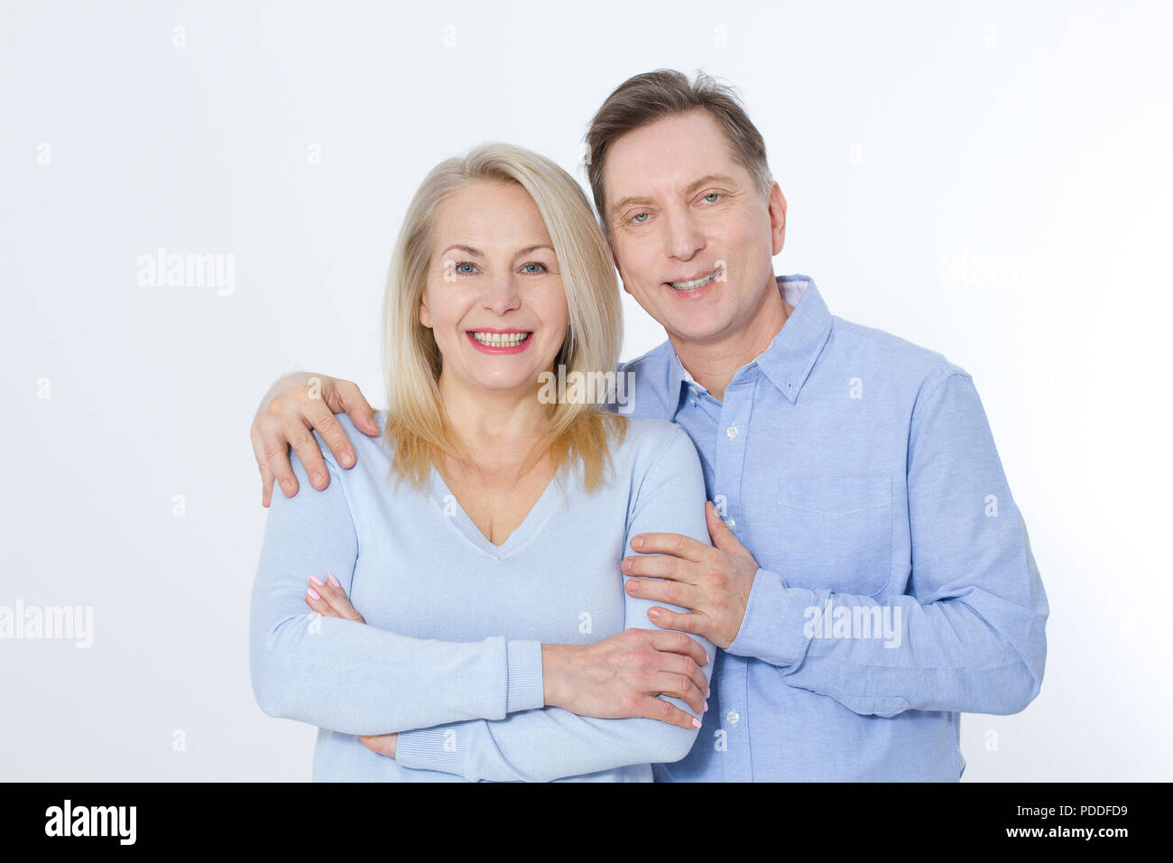 Beautiful Middle aged Couple portrait isolated on white. Stock Photo