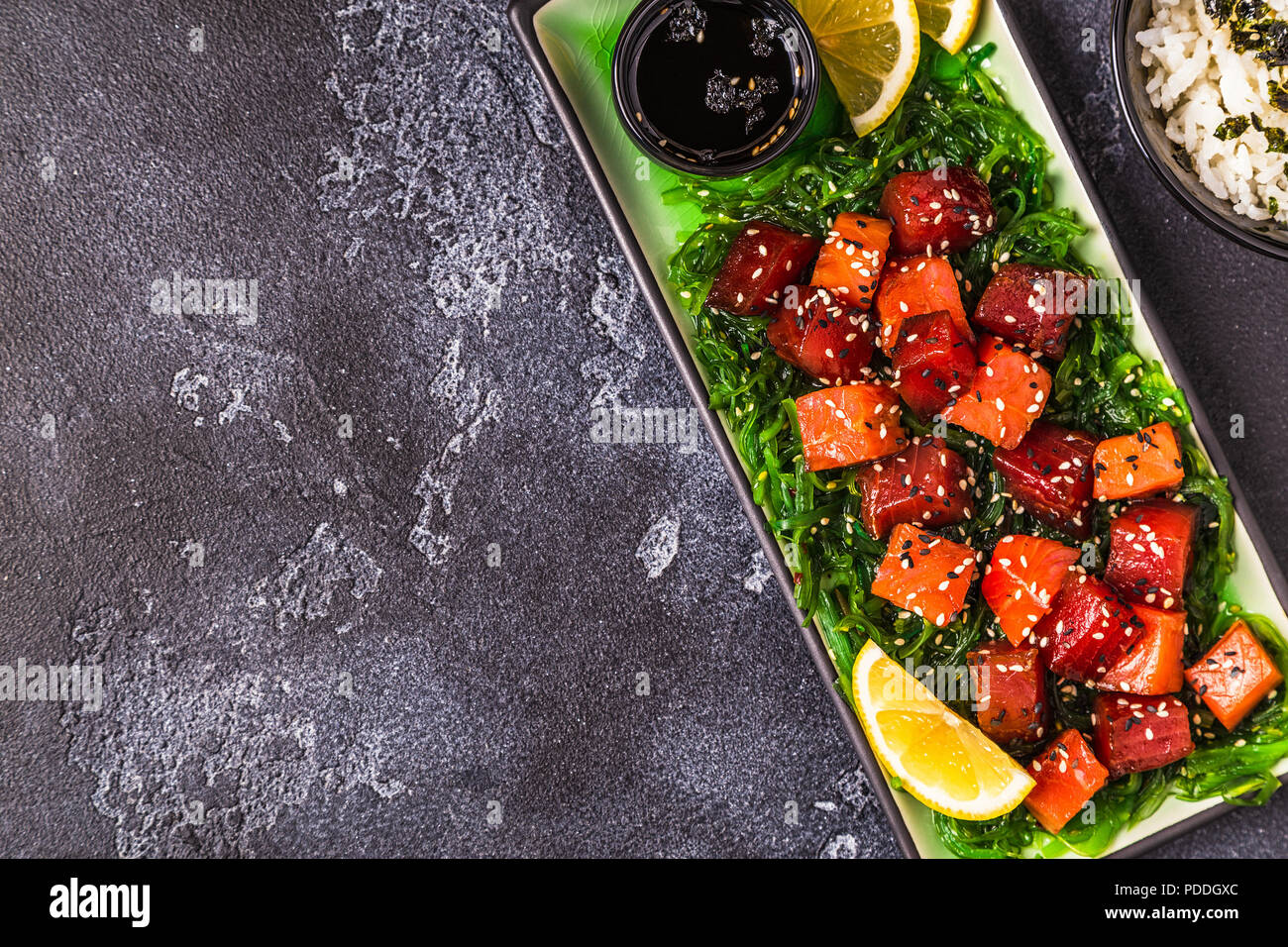 Poke, traditional Hawaiian raw fish salad, top view Stock Photo Alamy