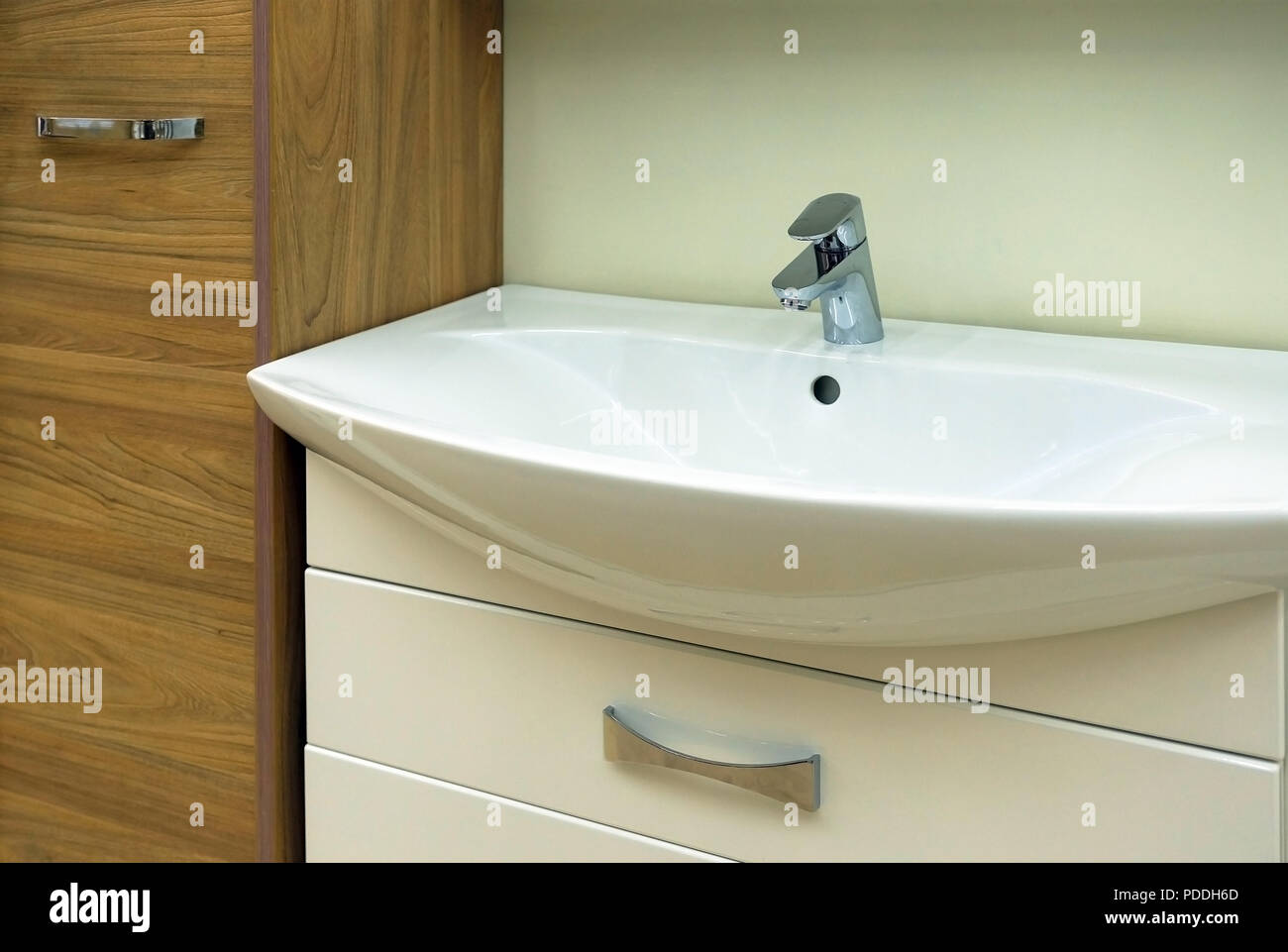 Wash Basin Modern Sink In The Bathroom Yellow Water Mixer Stock Photo Alamy