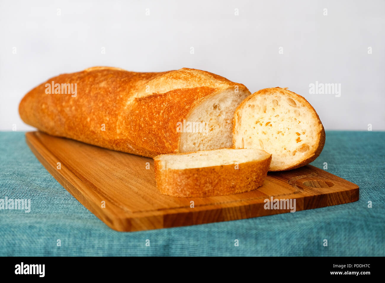 White Wheat Bread Fresh Bread On The Table In The Dark