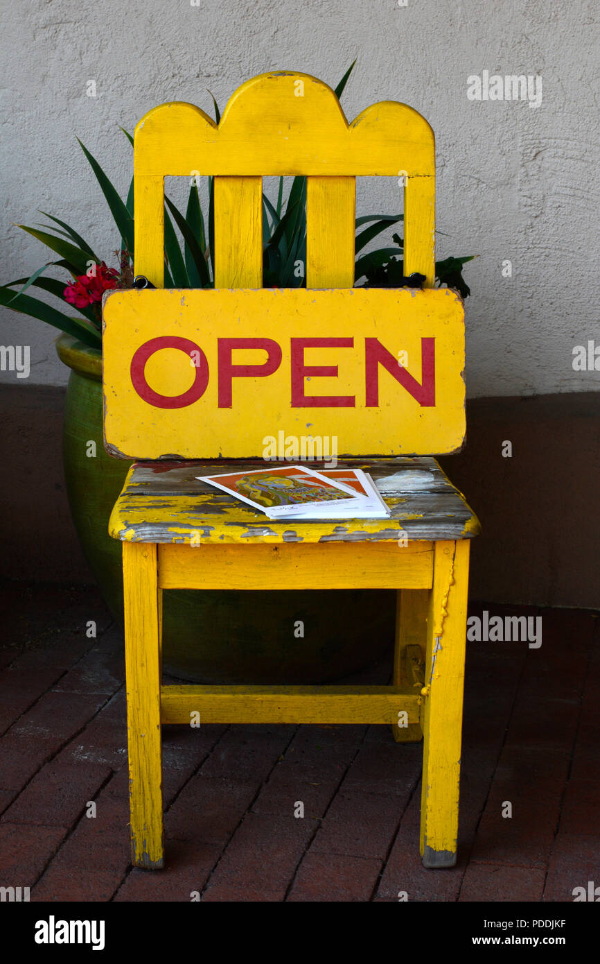 Open Sign On A Chair In Front Of An Art Gallery In Santa Fe
