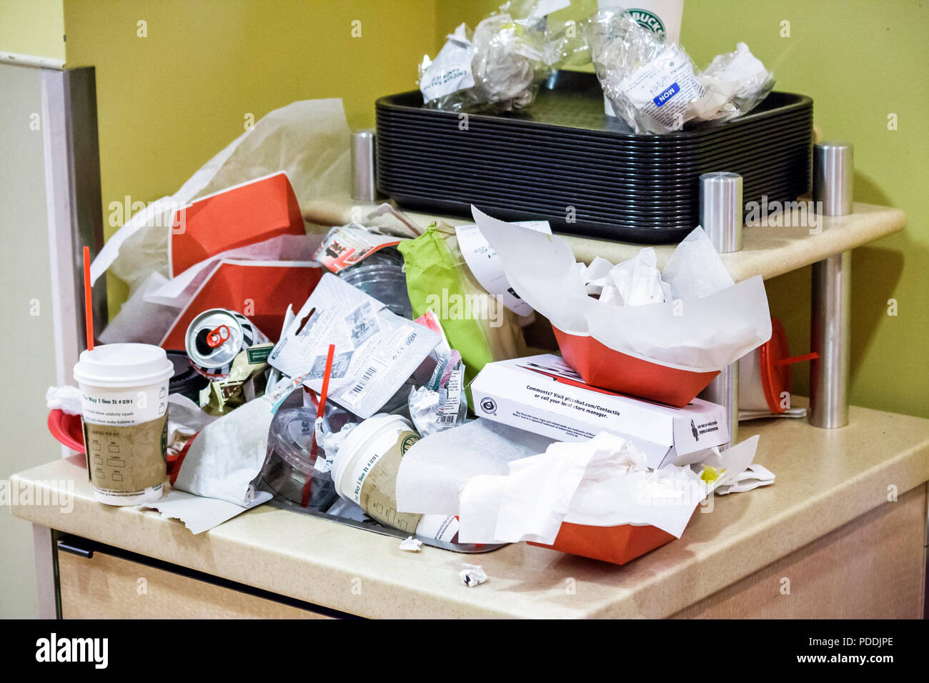 Miami Florida,Shops at Midtown,Target Discount Store,trash,cups,cans,food containers,paper,waste,dirty,nasty,overflow,full,FL080406093 Stock Photo