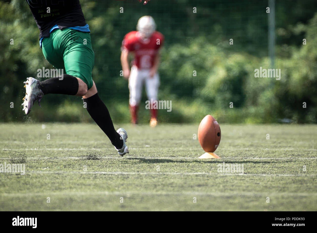 American football player kicking hires stock photography and images