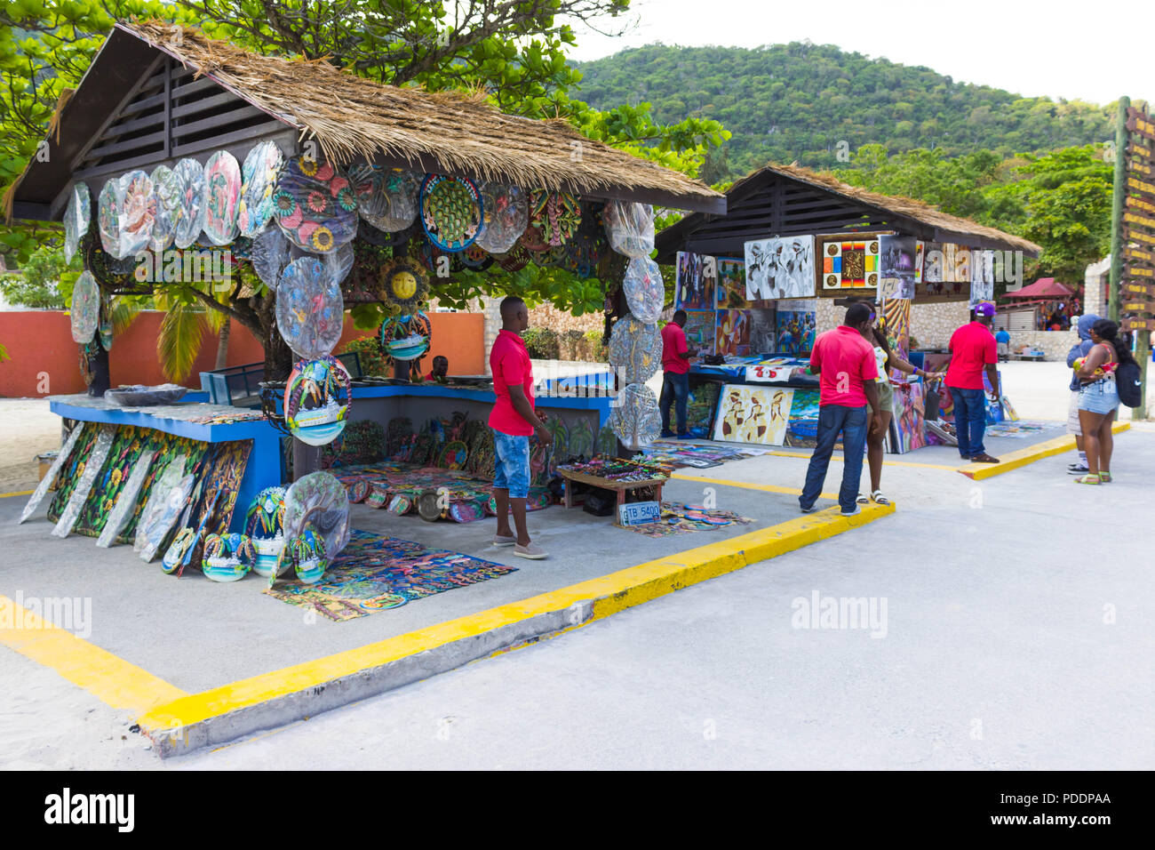 LABADEE, HAITI - MAY 01, 2018: Handcrafted Haitian souvenirs sunny day on beach at island Labadee in Haiti Stock Photo