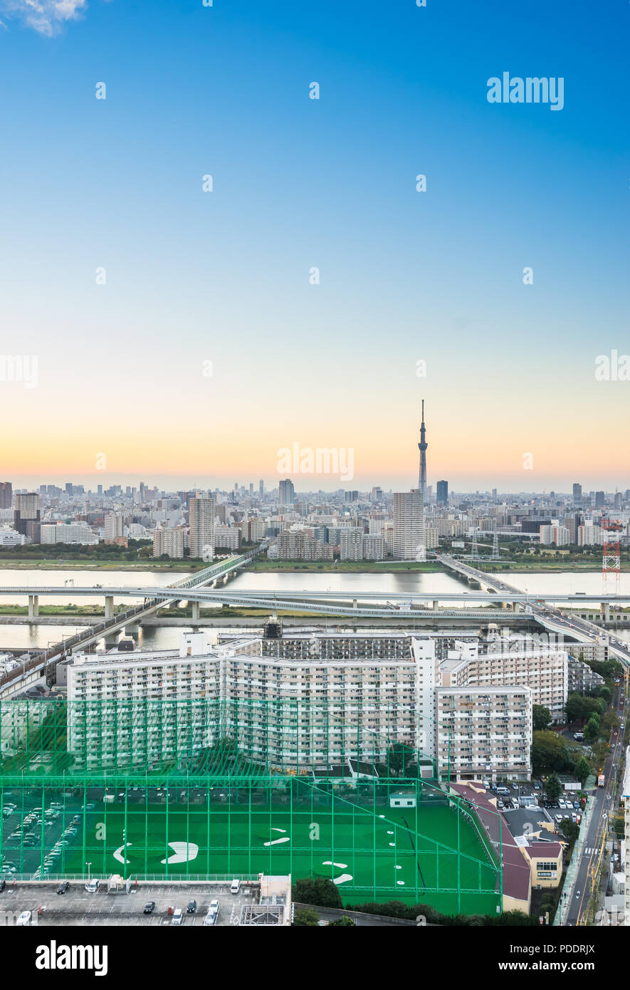 Business and culture concept - panoramic modern city skyline bird eye aerial view with tokyo skytree under dramatic sunset glow and beautiful cloudy s Stock Photo