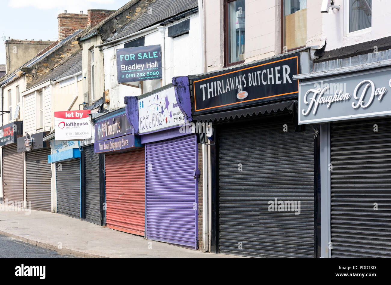 Shuttered shopfronts, Newbottle Street, Houghton-le-Spring, Tyne and Wear, England, United Kingdom Stock Photo