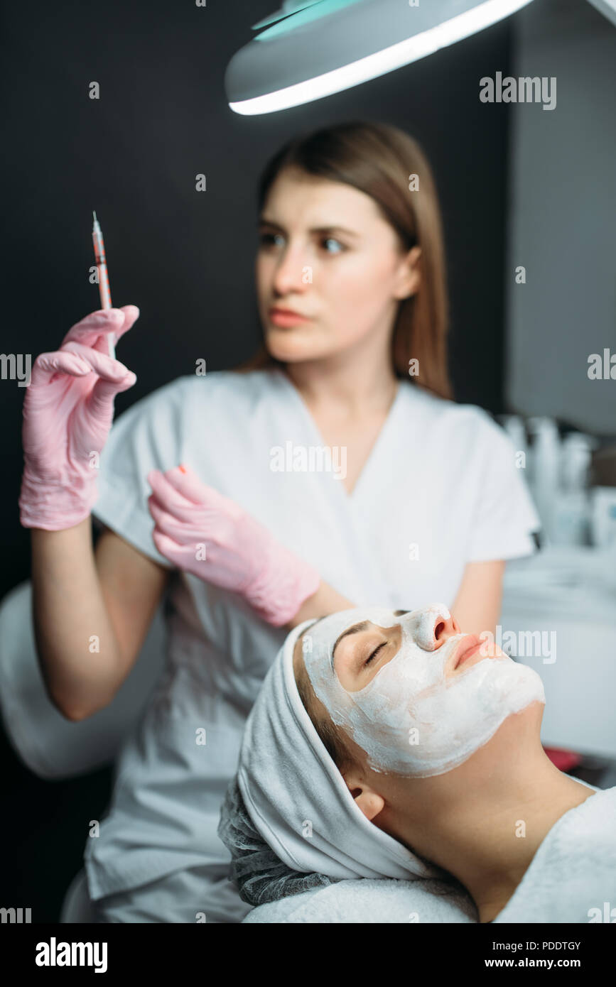 Beautician with syringe in hands, botox injection Stock Photo Alamy