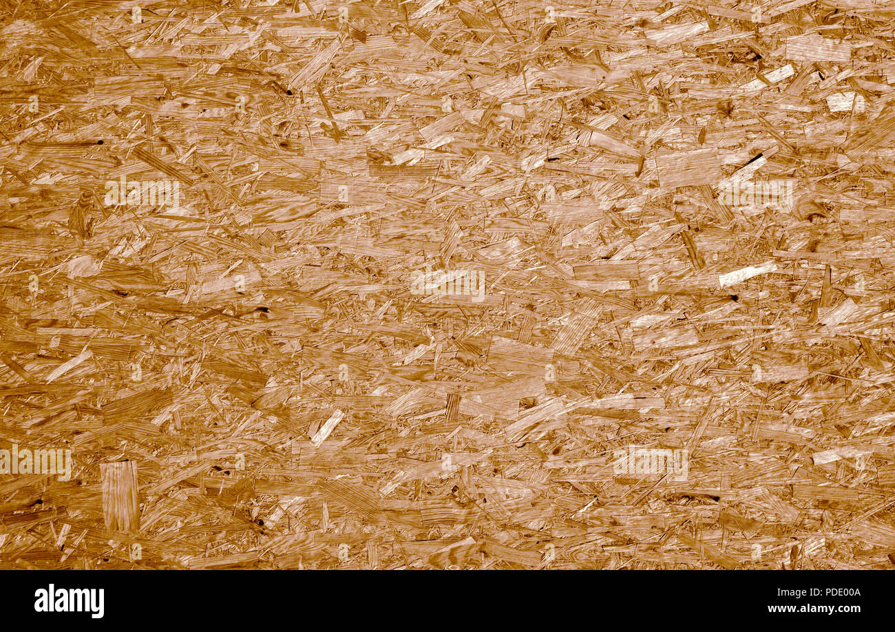 Fiberboard. Compressed light brown wooden texture Stock Photo