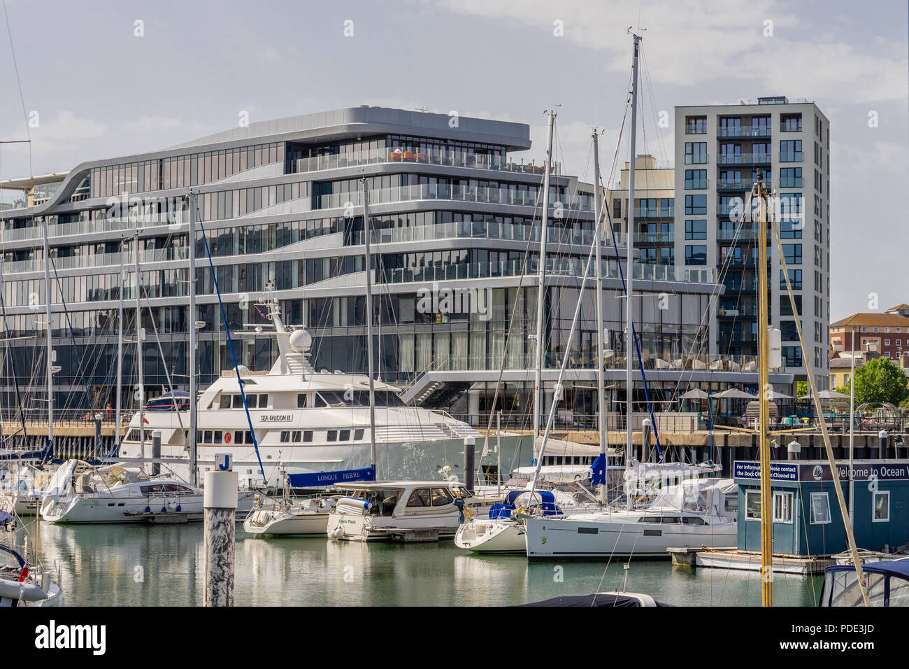 View across the Ocean Village marina to the Southampton Harbour Hotel and Spa, a new five star hotel in Southampton, Hampshire, England, UK Stock Photo