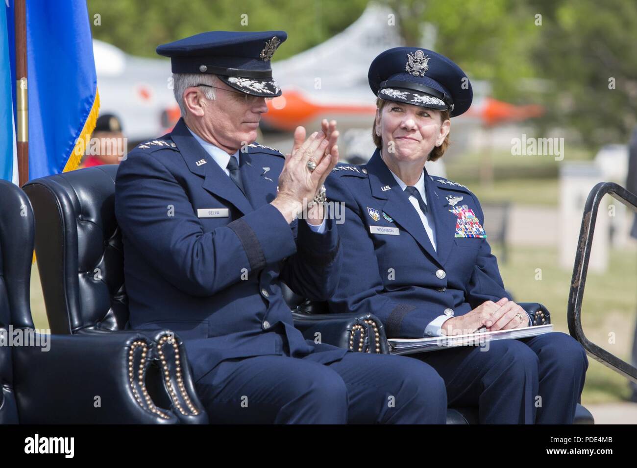 Vice Chairman of the Joint Chiefs of Staff, U.S. Air Force General Paul J. Selva, and the Commander of the North American Aerospace Defense Command and U.S. Northern Command, U.S. Air Force General Lori Robinson, participate in the NORAD 60th Anniversary Ceremony on Peterson Air Force Base Colorado, May 12. The ceremony and static display of various NORAD aircraft was the culmination of a three-day event, which included a media tour of Cheyenne Mountain Air Force Station, the dedication of a cairn outside the commands’ headquarters building memorializing the Canadians who have passed away whil Stock Photo